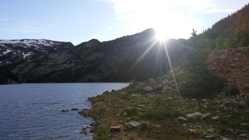 The sun sets over Bass Lake in early July.