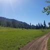 This is a view of the trail and a meadow just north of Red Butte.