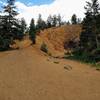 This is the tunnel at the end of Upper Gold Camp Road. Take the trail to the left of the tunnel. Take it to the top of the tunnel, then go right to find the trailhead.