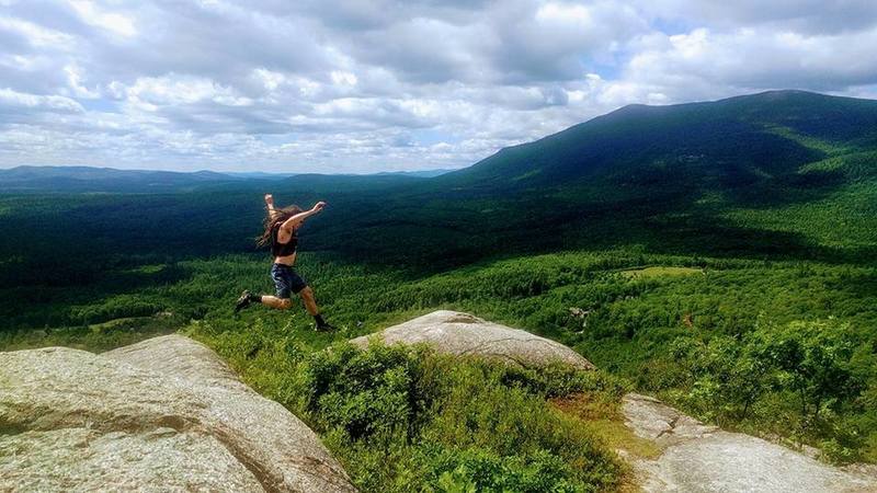 Playing around the slick rocks on top of White Horse Ledge.