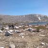 A sunny day brings big smiles to a group near Bighorn Lake on the Blackcap Basin Lakes Route.