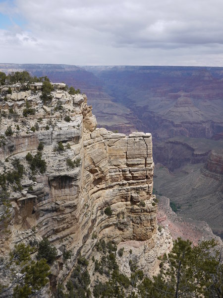 The Battleship juts out over the canyon below.