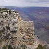 The Battleship juts out over the canyon below.