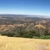 Enjoy great views near the summit looking back toward the town of Los Olivos with coastal fog visible in the distance.