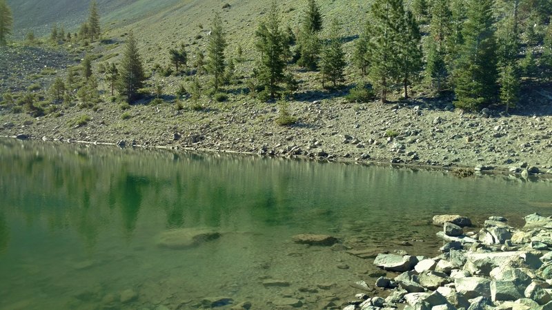 This is the Crags Lake shoreline in Chaos Crater of the Chaos Crags – a cluster of six dome volcanoes.