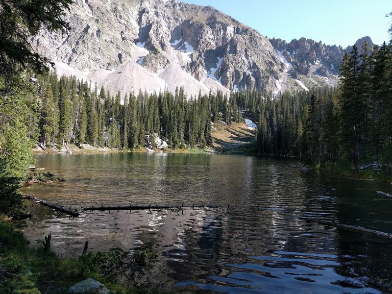 Lower Trampas Lake takes part shade and part sun in the late afternoon.