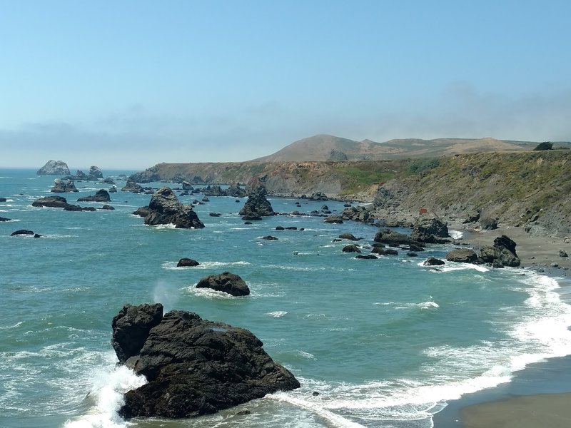 Enjoy gorgeous coastal waters looking north at Furlong Gulch Beach.