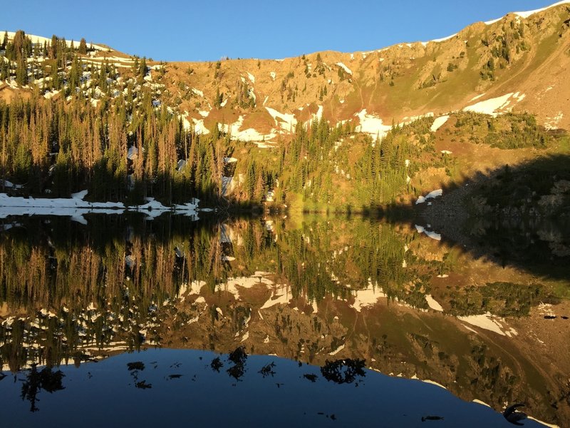 The sun rises over Bowen Lake.