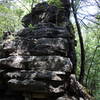 An impressive rock pillar stands along the loop.