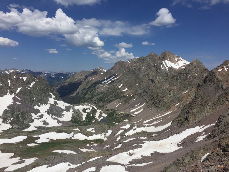 Enjoy a stunning view from the pass west towards Vestal and Arrow Peaks.