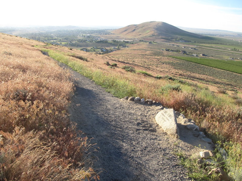 Candy Mountain's Lake Lewis marker marks the lake level of Lake Lewis during the Ice Age Floods. Badger Mountain can be seen in the background.