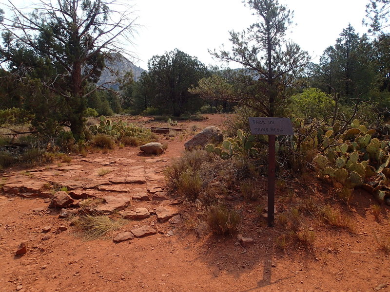 This sign marks the trailhead at Vultee Arch Road.