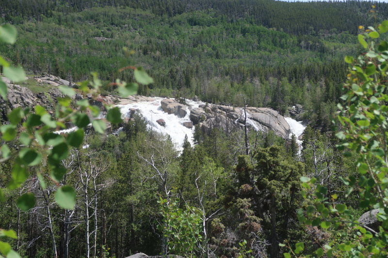 Popo Agie Falls cascades torrentially across the way from the trail.