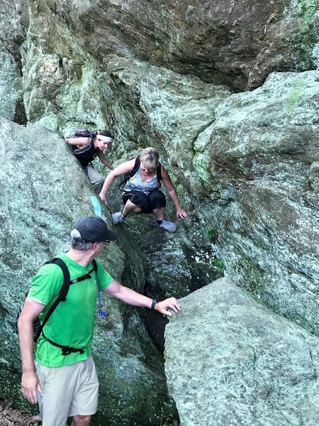 Rock Scramble coming out of Leathermans Cave.