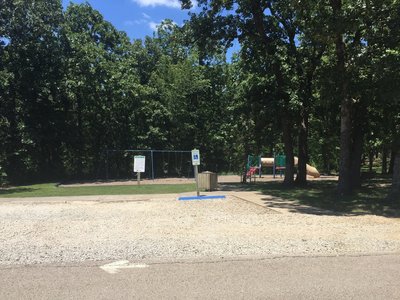 Trailhead behind playground