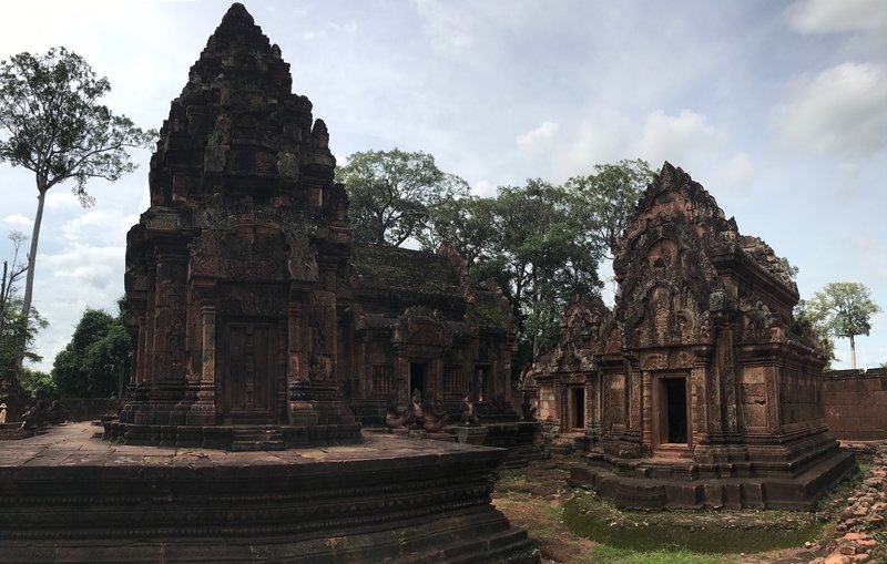 Observing the intricate carvings at Banteay Srei.