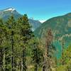 Davis Peak, MacMillan Spires, distant glacier, and nearby shoulder of Sourdough Mountain (left to right) rise above Diablo Lake, looking northwest from Thunder Knob