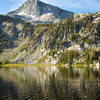 Mirror Lake reflects the craggy rocks up to Eagle Cap.