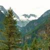 In the distance are Mount Torment, Forbidden Glacier, Inspiration Glacier, and Eldorado Peak, seen looking southwest up the West Fork of the Thunder Creek Valley, from Thunder Creek Trail