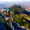 Scrambling up a rock outcrop on the Grandfather Trail.