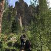 Spire 2 and the Khayyam Spire towering above the trail