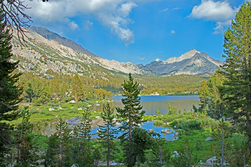 Looking west across BullFrog Lake, with the valley containing Charlotte Lake in the distance.