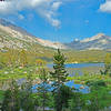 Looking west across BullFrog Lake, with the valley containing Charlotte Lake in the distance.