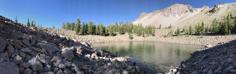 View of Chaos Crags from the shore of Crags Lake.