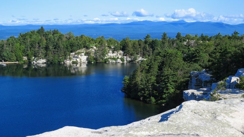 Be sure to stray from the carriage trail and investigate the cliffs overlooking Lake Minnewaska. The peaceful lake with the Catskill Mountains as a backdrop is the perfect way to start this hike.