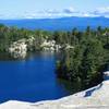 Be sure to stray from the carriage trail and investigate the cliffs overlooking Lake Minnewaska. The peaceful lake with the Catskill Mountains as a backdrop is the perfect way to start this hike.