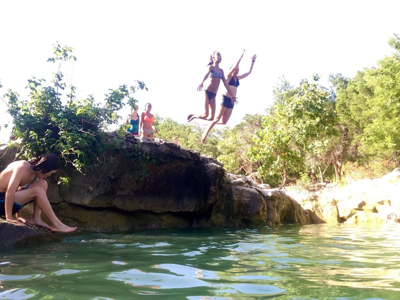 1....2....3.... JUMP ! It's only about 10 feet deep (at this water level) and just a few stokes to get back to shallows.