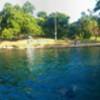 Barton Springs at Zilker Park... a small fee to get in (like 3 bucks). If you are on the Barton Creek Trail, this is a nice stop to eat lunch and take a cool dip.