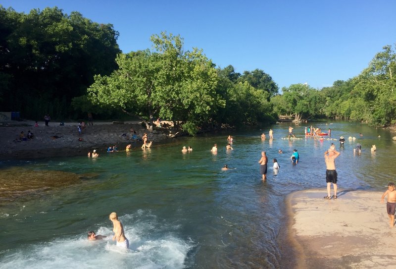 View from Barton Springs out towards the spill out creek finger that heads to the river.  This is a weekday! Weekends are a bit overcrowded (expect to share the space with friendly 4:20 peeps).