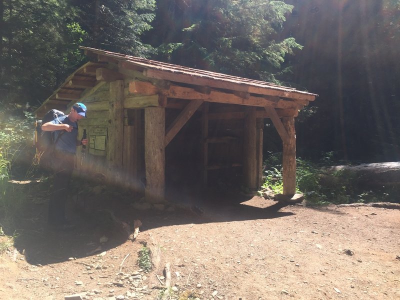 The 'emergency shelter' at Elk Lake has a few rustic bunks. Similar shelters exist at most campsites on the trail.