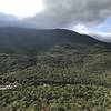 Late-day clouds cover the summit of Mount Washington as seen from Square Ledge.