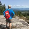 Sweeping lake and mountain views from ledges near the Belknap Mountain summit.