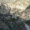 A precariously perched railway remnant juts out over the steep slopes of Castle Canyon.