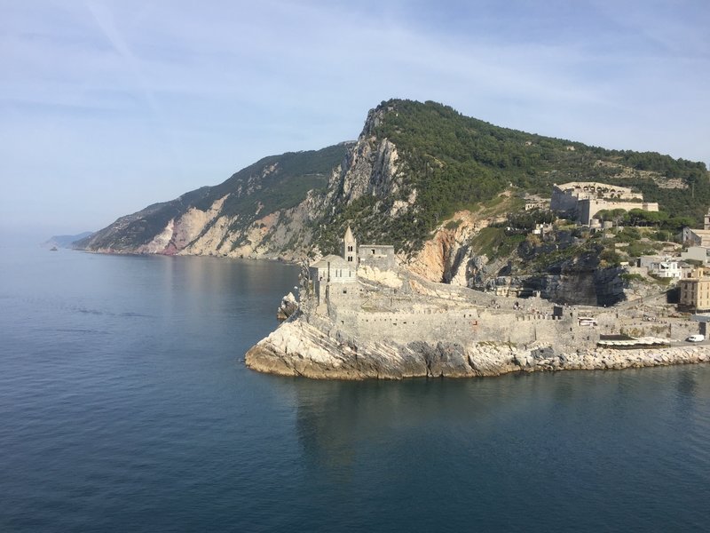 Stunning views looking back on Porto Venere (San Pietro church at center and Castello Doria on the hill at right) and up towards the Cinque Terre