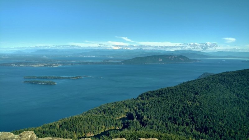 View looking east-northeast, San Juan Islands with Mt Baker in the center in the distance.