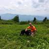 This is the meadow at the top. And this is Bodhi. He is not our dog; he was a dog from the neighborhood who led us up the trail. At one point he surprised us at the other end of a crawl through space.