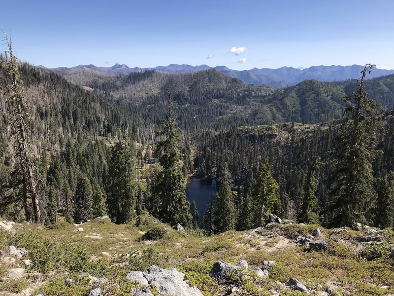 View of Meteor Lake from Haypress Trail with Marble Mountain and Pacific Crest in the background.
