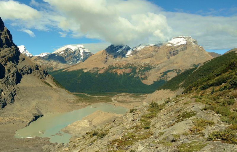 Glacial Robson Lake where Robson River begins, with the Robson River Valley in the center, bending left. Looking back (northwest) down the Snowbird Pass Route.