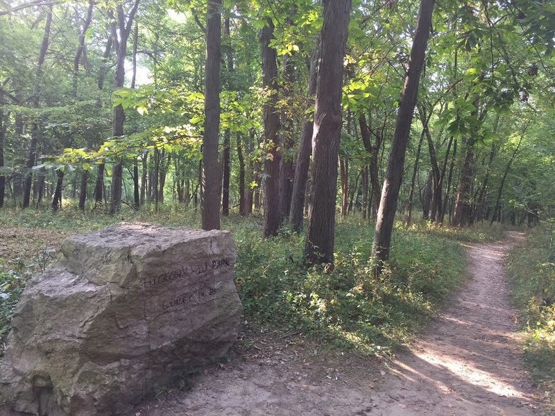 Boulder at the Oakland Cemetery entrance to Hickory Hill Park.