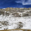 Cliffs to the left with ibex about 4/5ths of the way up (they are very small in the picture)