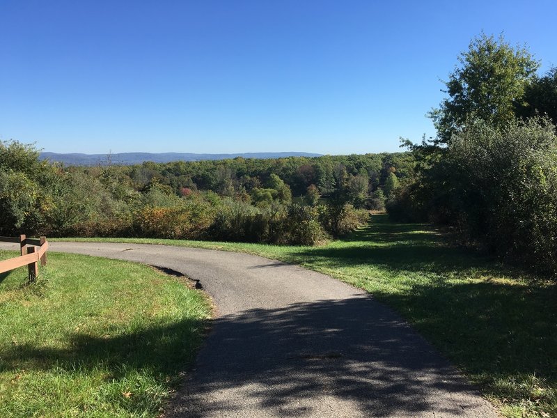 View from Baptist Church Road lot down into the park. Manny Lake in the center