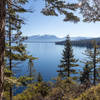 Lake Tahoe through the lush green on Rubicon Trail