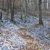 Snow may rest in the shaded parts of the mountains, even if there was no snow at the start of the trail.