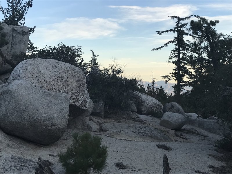 Unique and large granite boulders dot the hillsides along the trail