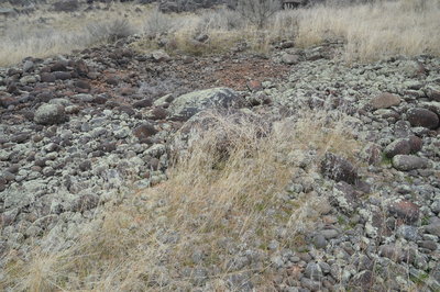 Very center of a pothole showing what was left of huge boulders
