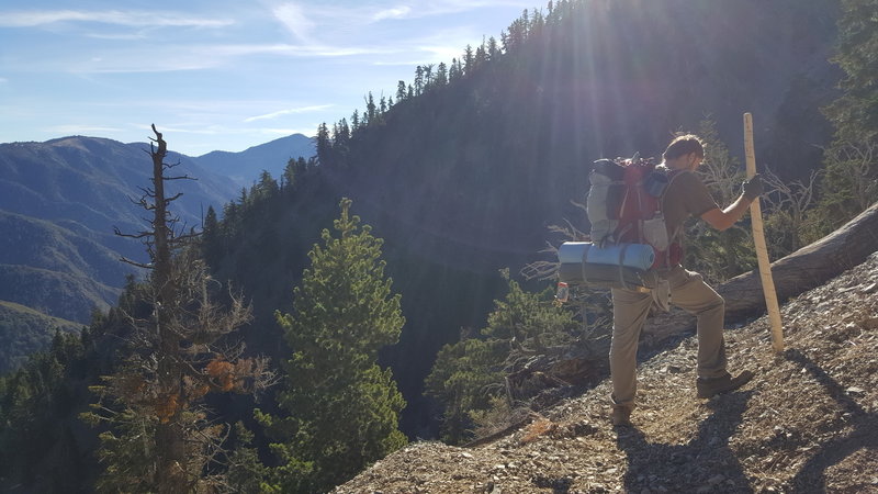 Rounding Switchbacks. Nice elevated views after the 4th. Heavy packs going up.